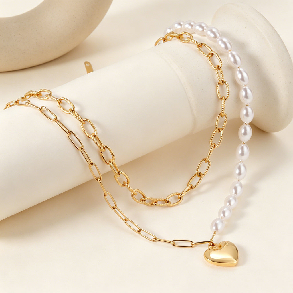Damen Halskette mit mehrlagigem Design aus Edelstahl und goldplattiertem Herzanhänger Shop Nory