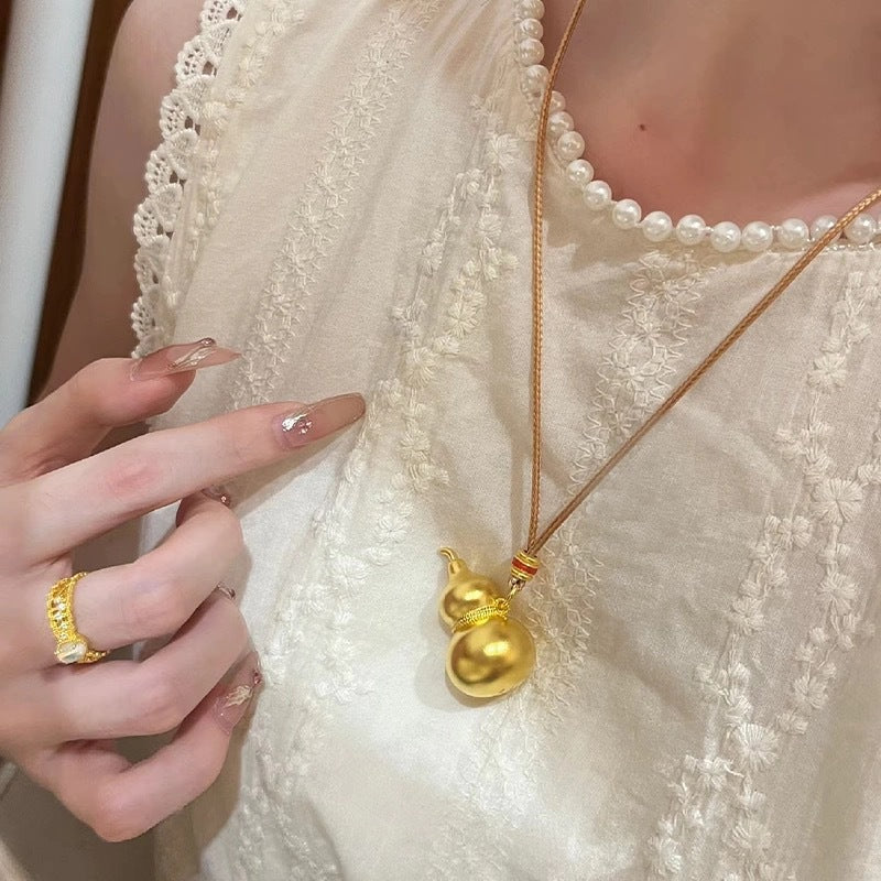 Damen Halskette mit kunstvollem Kürbisanhänger aus hochwertigem Edelstahl Shop Nory