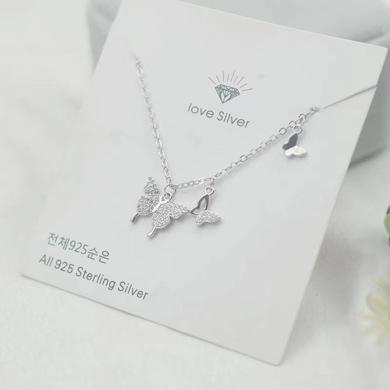 Damen Halskette mit filigranem Schmetterlingsdesign und funkelnden Zirkonia Shop Nory