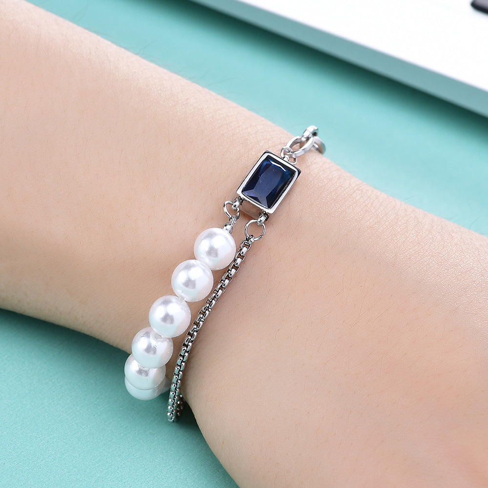 Damen Armband mit elegantem Perlen-Design und stilvollem Anhänger Shop Nory