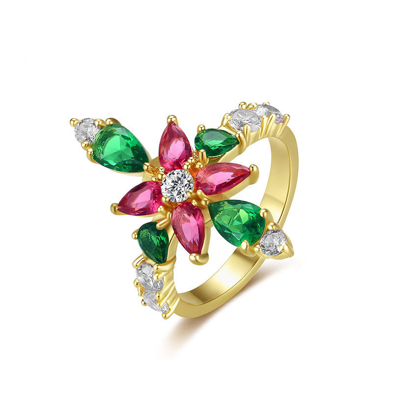 Damenring mit kunstvollem Blumenmuster und funkelnden Edelsteinen Shop Nory