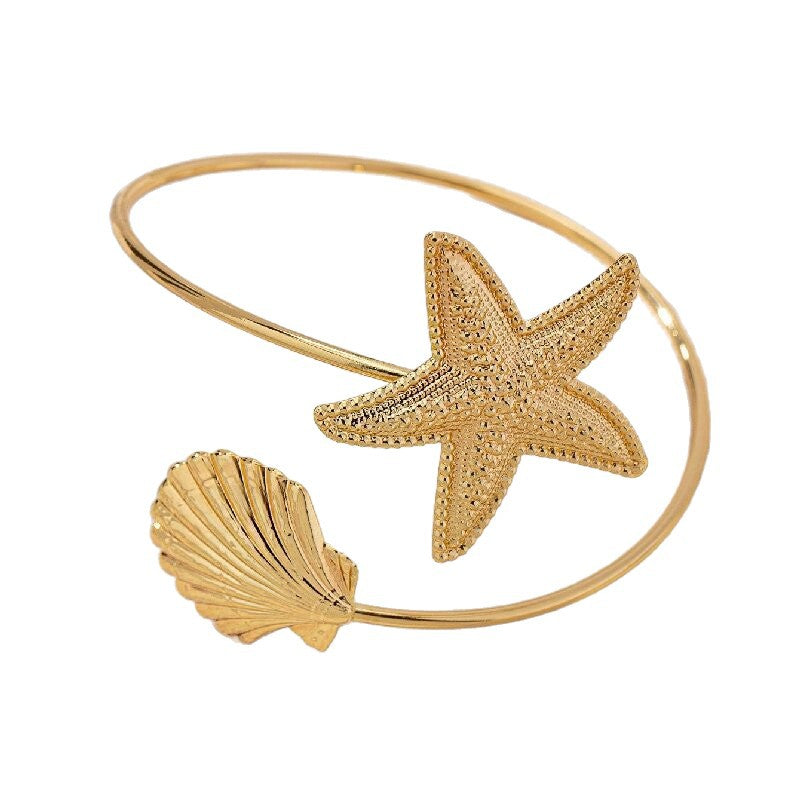 Damen Offener Armreif mit maritimem Sternen- und Muschel-Design Shop Nory