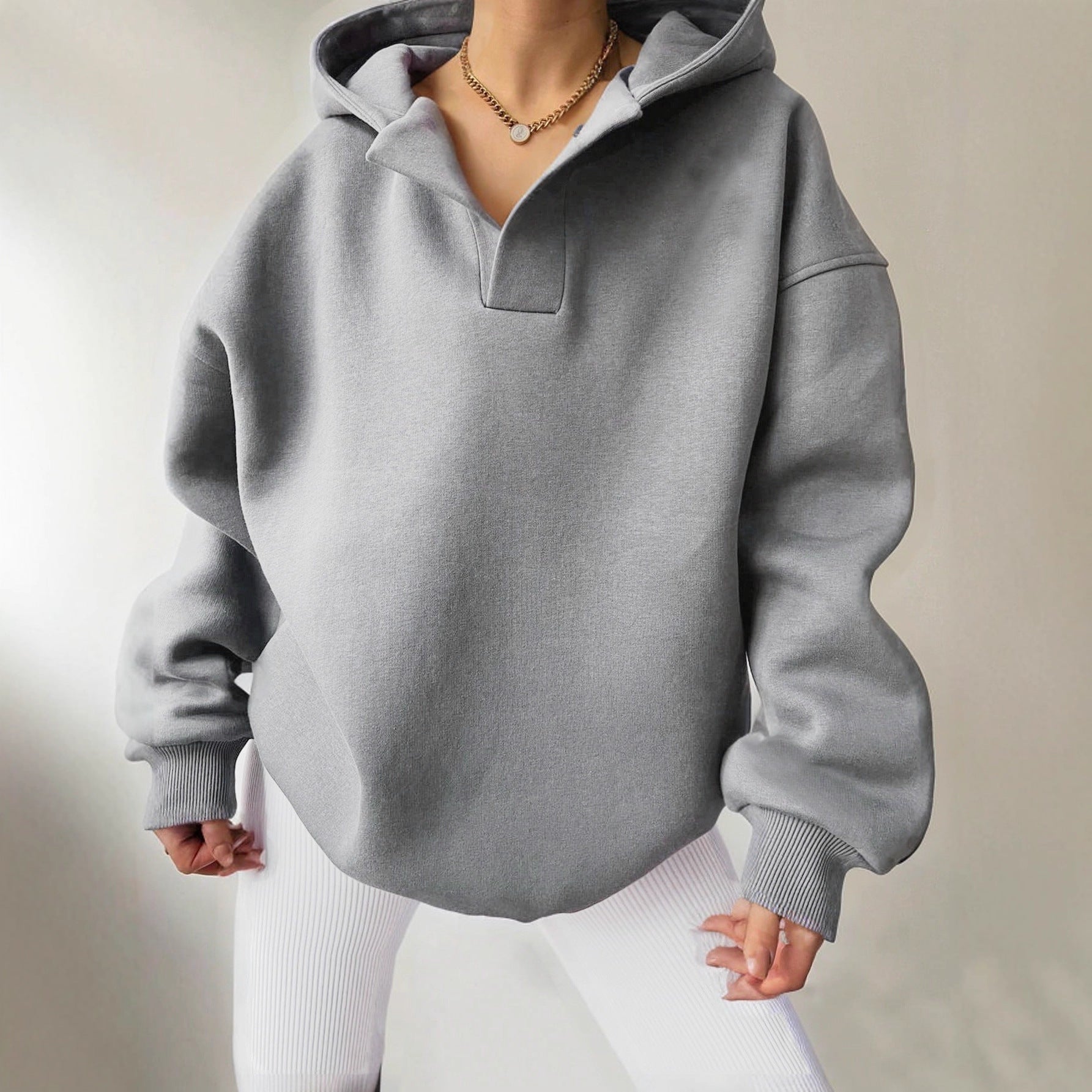 Damen Kapuzensweater mit übergroßem Schnitt und V-Ausschnitt