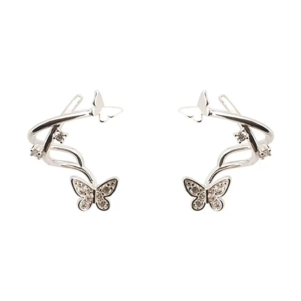 Damen Ohrringe mit glitzernden Schmetterlingen und elegantem Twist-Design Shop Nory