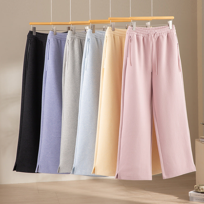 Damen weite French‑Terry Lounge-Sweatpant mit hohem Bund, Kordelzug und seitlichen Schlitzen Shop Nory
