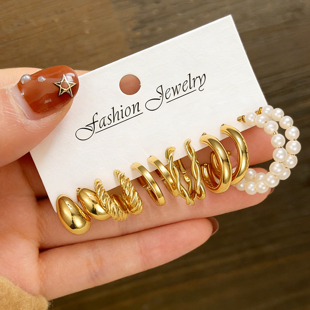 Damen Ohrstecker-Set mit eleganten Gold- und Perlenakzenten Shop Nory