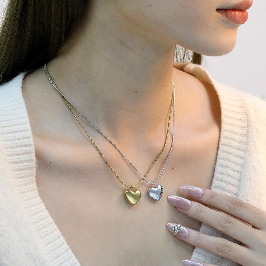 Damen Halskette mit herzförmigem Anhänger aus hochwertigem Edelstahl Shop Nory