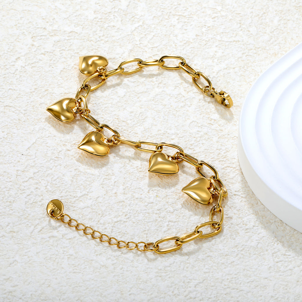 Damen Armband mit herzförmigen Anhängern und elegantem Gliederdesign Shop Nory