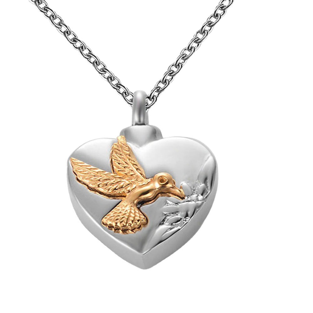 Damen Herzanhänger mit filigranem Vogelmotiv Shop Nory