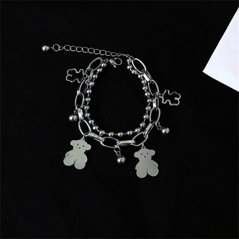 Damen Charm-Armband aus hochwertigem Edelstahl mit verspieltem Bären-Anhänger Shop Nory