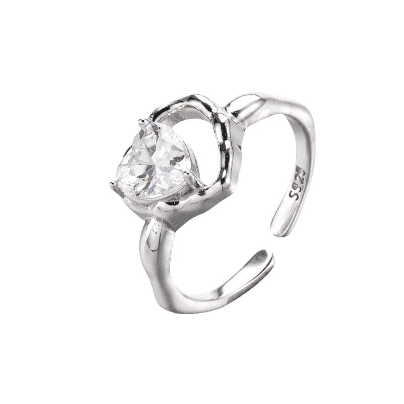 Damenring mit elegantem geschwungenen Design und funkelndem Zirkon Shop Nory