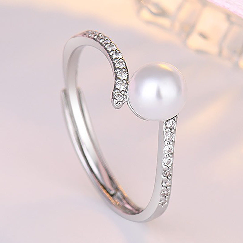 Damenring mit eleganter Perle und funkelndem Zirkonia-Besatz Shop Nory