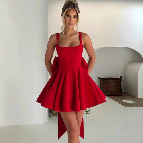 Damen Cocktailkleid mit oversized Schleifen-Design und fließendem Rock