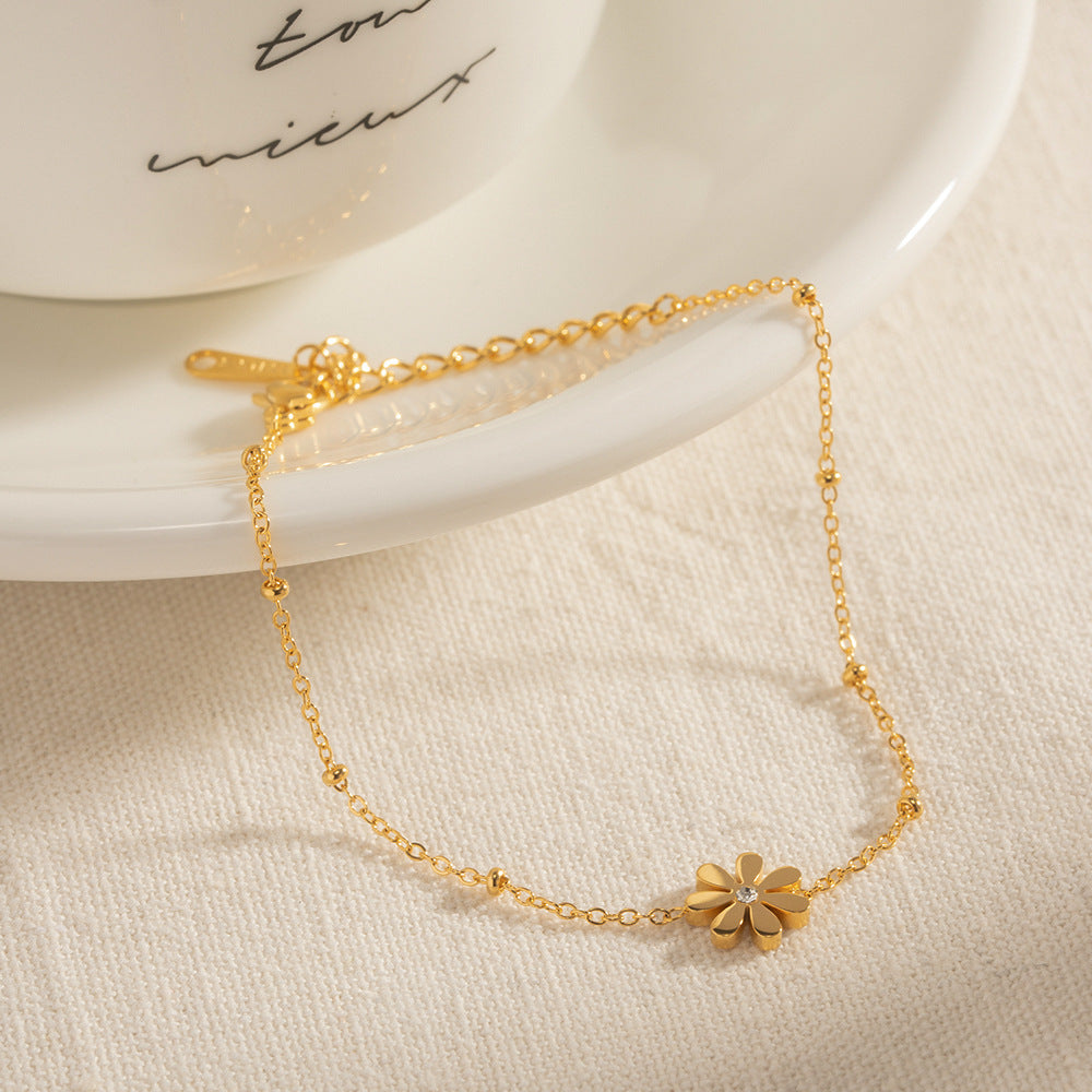 Damen Fußkettchen mit floralen Motiven und funkelndem Zirkonia Shop Nory