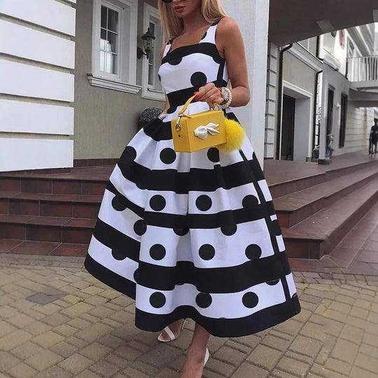 Damen Elegantes Midi-Kleid mit strukturiertem Polka-Dot-Design und schwingendem Rock Shopnory