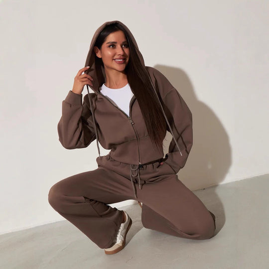 Damen kurzes Kapuzen-Zipshirt mit tailliertem Tunnelzug und weit geschnittene High-Waist-Loungehose Shop Nory
