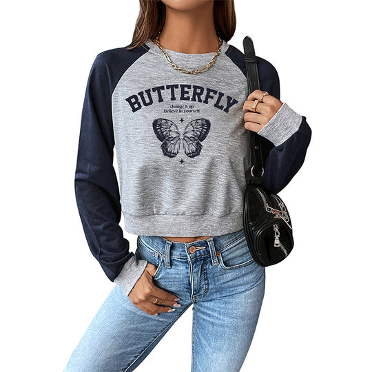 Damen Cropped Raglan-Sweatshirt mit Schmetterling-Print, geripptem Saum und lässiger Passform Shop Nory