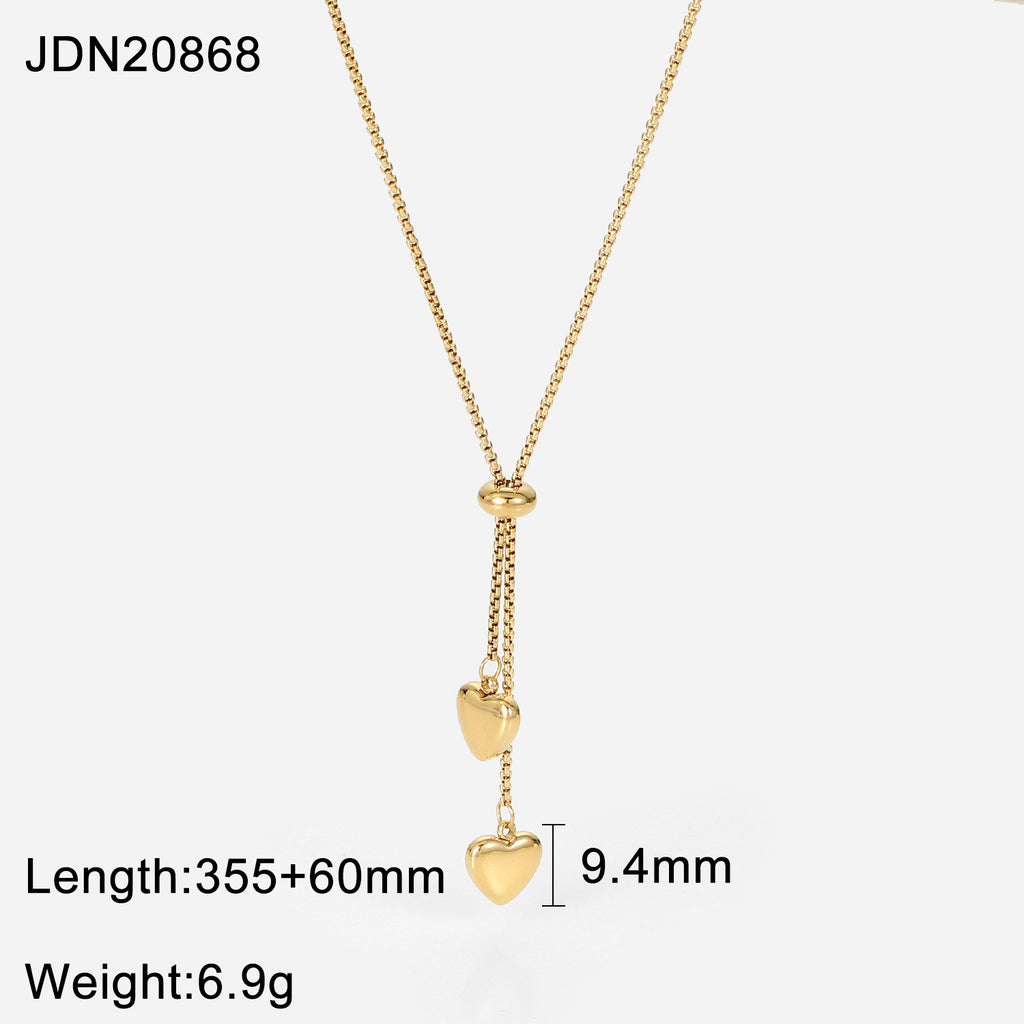 Damen Armband mit eleganten Perlen und herzförmigem Anhänger Shop Nory