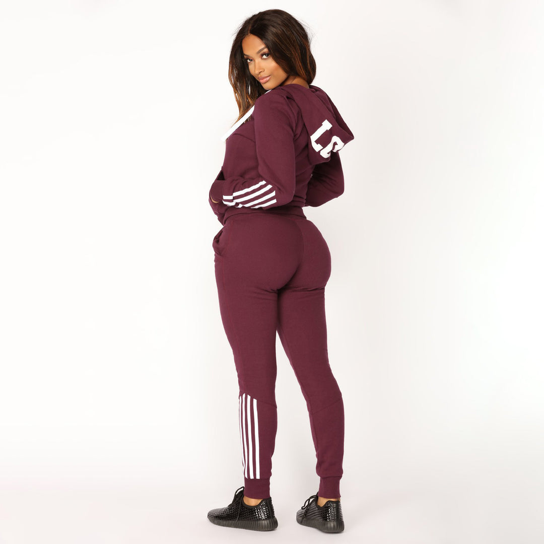 Damen sportliches Zip-Hoodie und Slim-Jogger-Set aus French-Terry mit kontrastierenden Streifen Shop Nory
