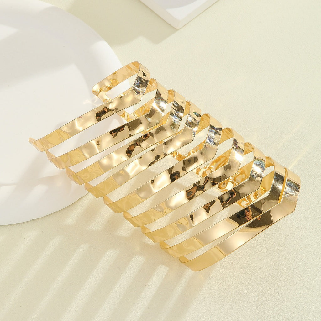 Damen Haarschmuck mit glänzenden, geschwungenen Elementen Shop Nory