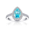 Damen eleganter Tropfenring mit funkelndem aquablauem Hauptstein und Zirkonia-Besatz Shop Nory