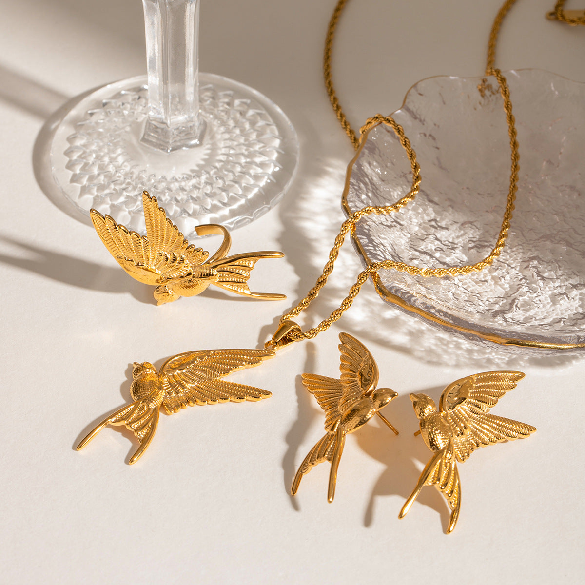 Damen Ohrhänger im eleganten Vogelmotiv aus hypoallergenem Edelstahl Shop Nory
