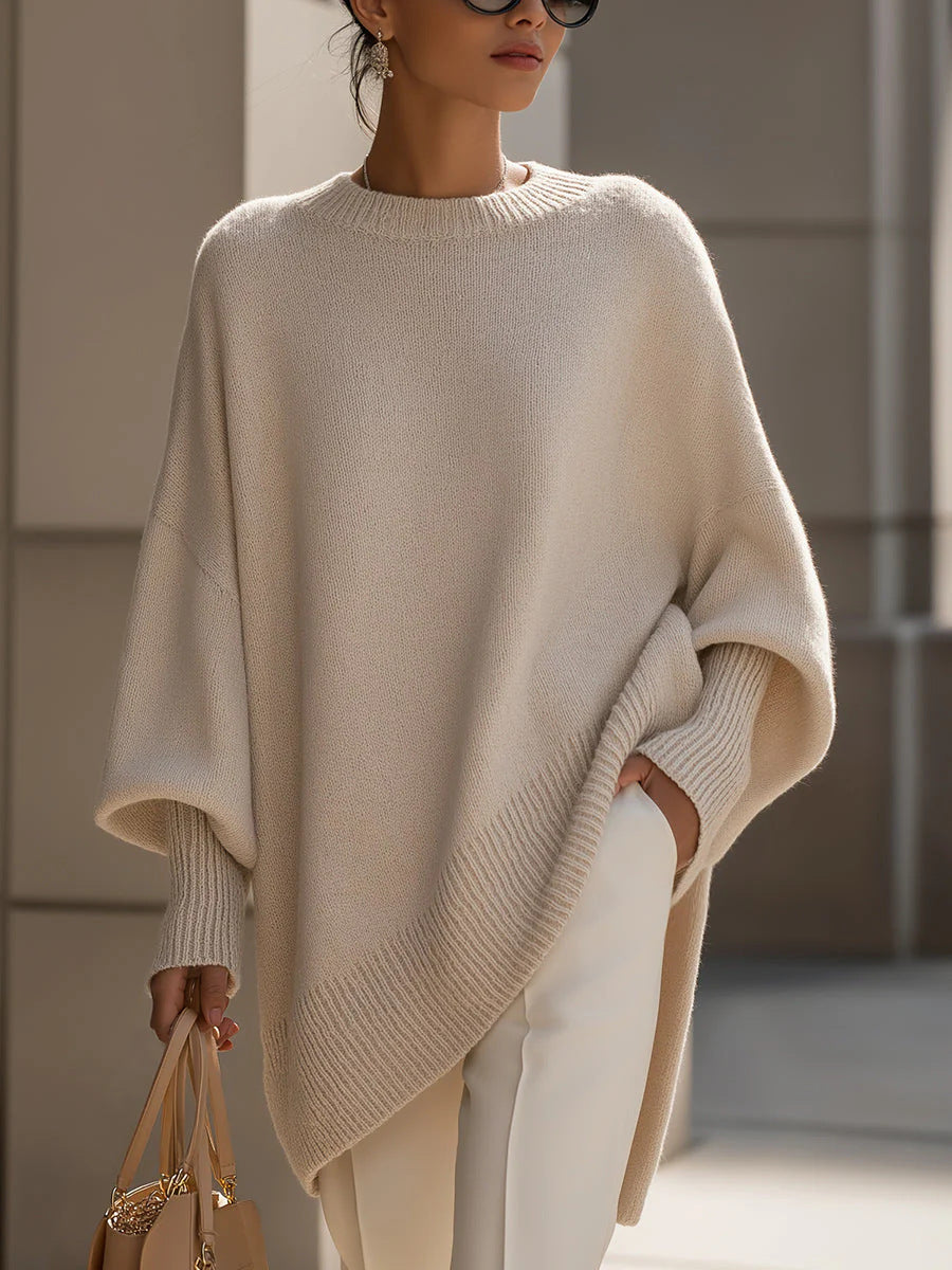 Damen nan Oversize Strickponcho mit asymmetrischem Saum und gerippten Ärmeln Shop Nory