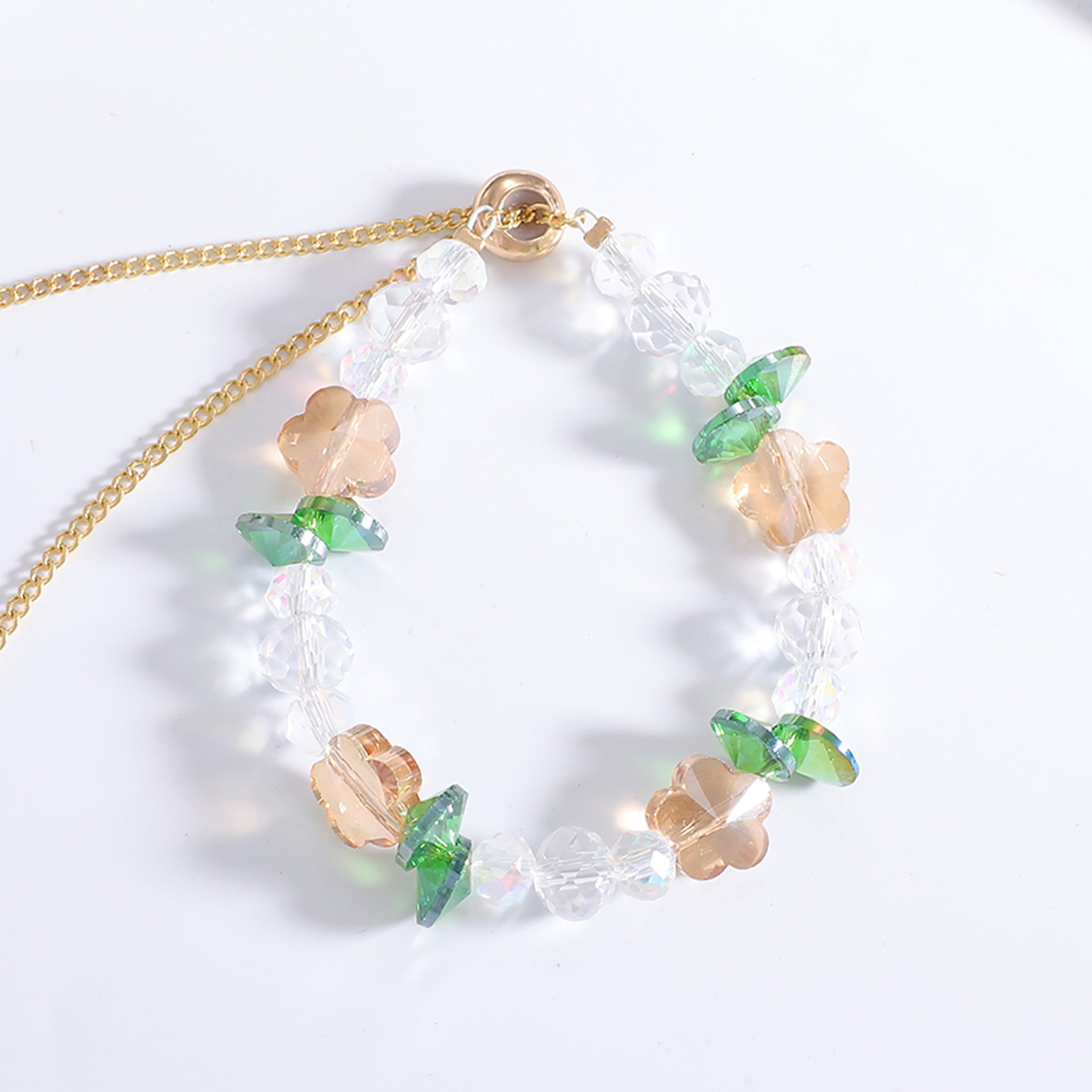 Damen Halskette mit funkelnden Kristallperlen und floralen Akzenten Shop Nory
