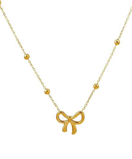 Damen Halskette mit filigranem Schleifenanhänger und glänzenden Kugeldetails Shop Nory