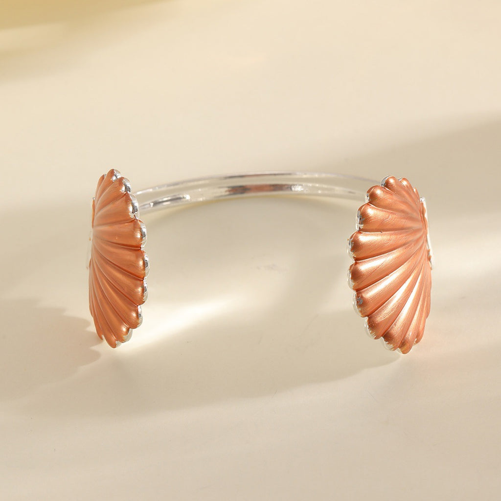 Damen Armreif mit kunstvollem Muschel-Design Shop Nory