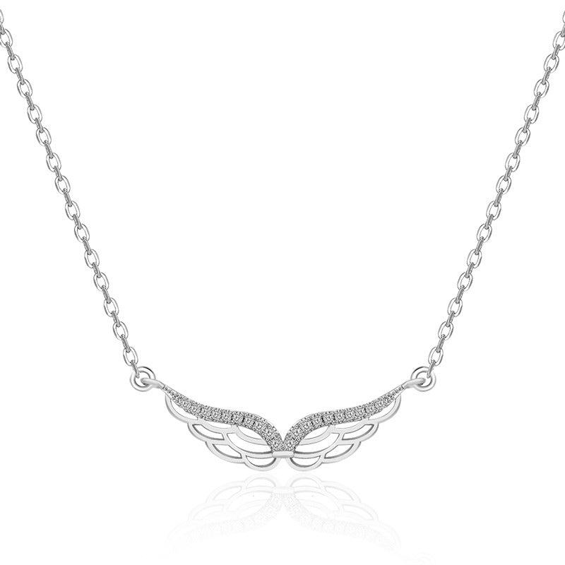 Damen Halskette mit elegantem Flügelanhänger und funkelnden Zirkonia Shop Nory