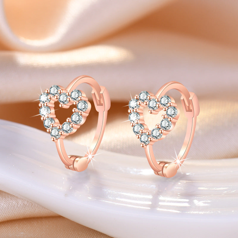 Damen Ohrringe mit herzförmigem Design und funkelnden Zirkonia Shop Nory
