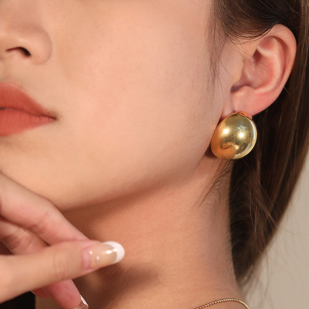 Damen Ohrstecker mit elegantem, geschwungenem Design und hochglänzender Oberfläche Shop Nory