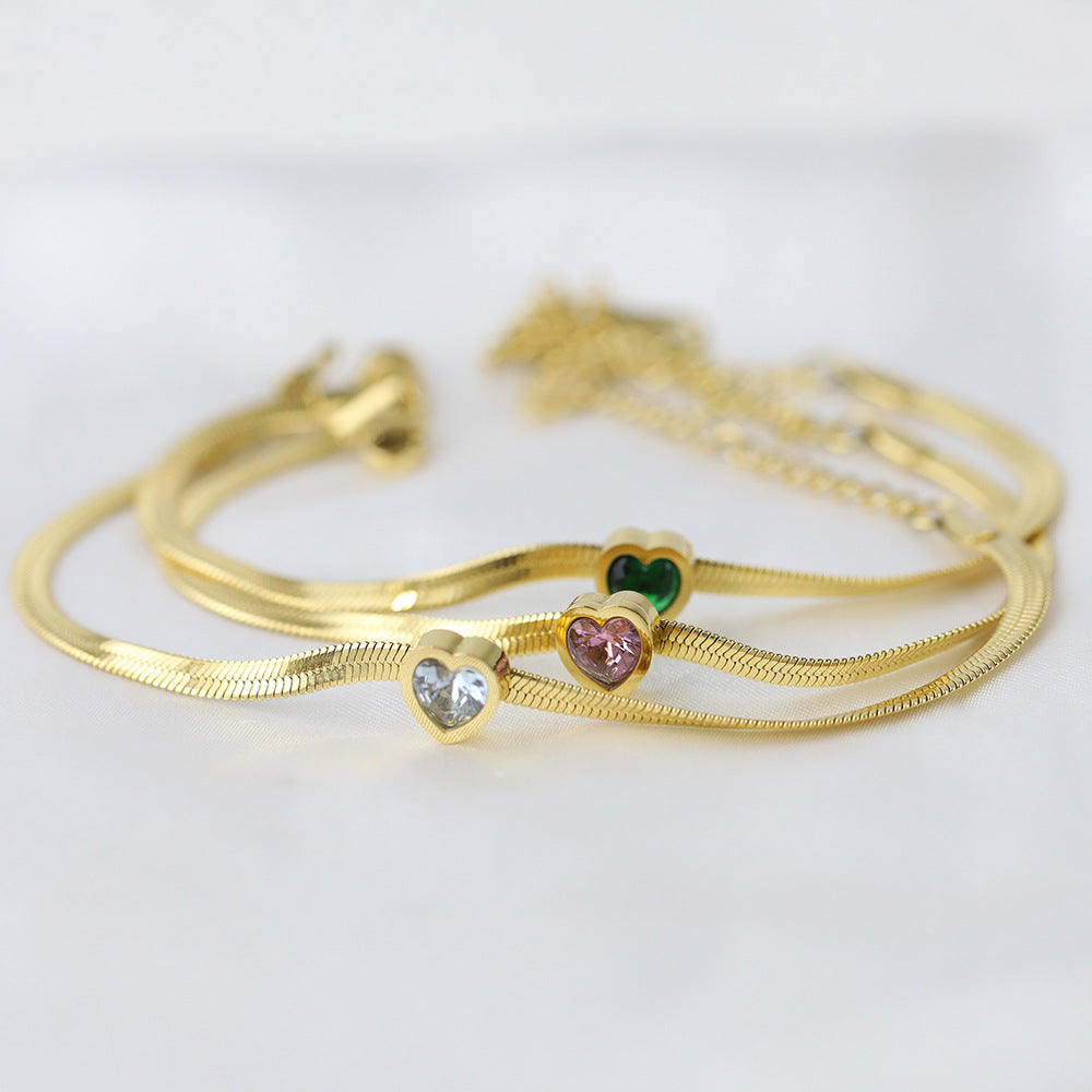 Damen Armband mit grünem Herz-Anhänger und elegantem Drahtdesign Shop Nory