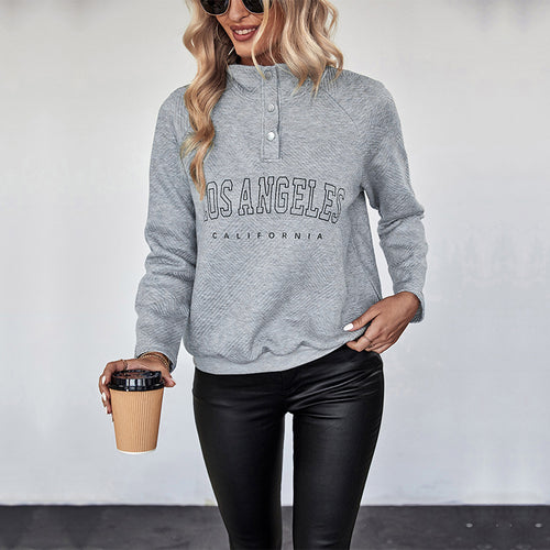 Damen Quilted-Sweatshirt mit Stehkragen, Druckknopfleiste und College-Print Shop Nory