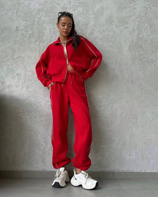 Damen lässiges Sweatset mit Stehkragen Reißverschluss gekürzter Jacke und hochtaillierter Schlaghose Shop Nory