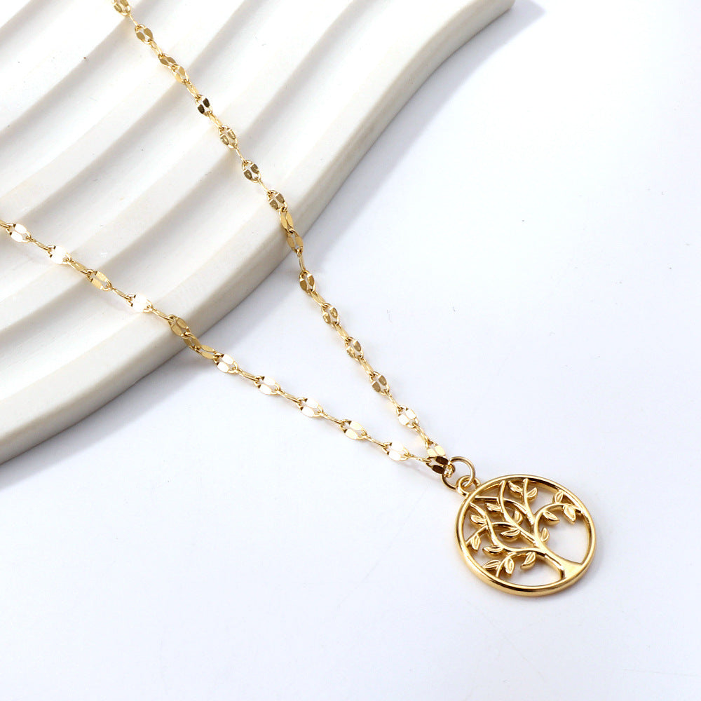Damen Halskette mit kunstvollem Baum-Motiv aus hochwertigem Edelstahl und Goldbeschichtung Shop Nory
