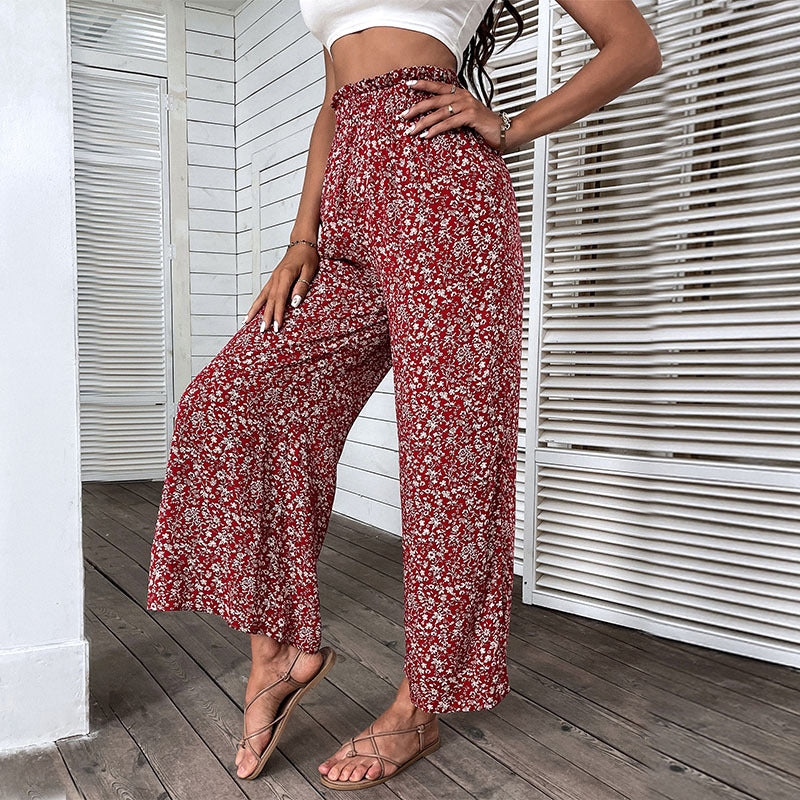 Damen Weite hochgeschnittene Palazzo‑Hose mit floralem Muster und seitlichem Beinschlitz Shop Nory
