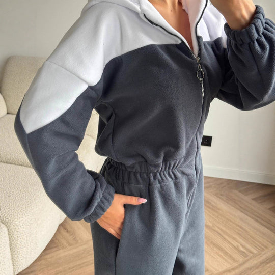 Damen gemütlicher Fleece-Overall mit Kapuze, durchgehendem Reißverschluss und elastischen Bündchen Shop Nory
