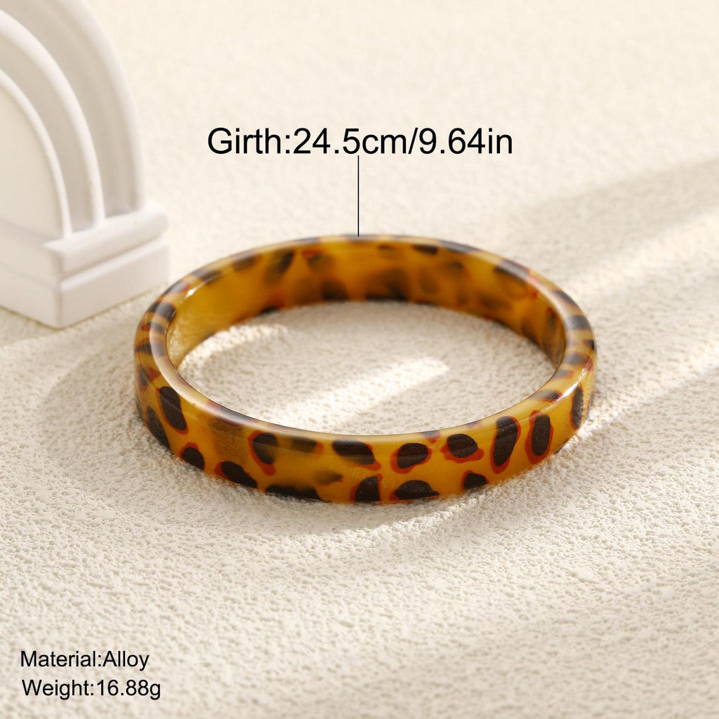Damen Armreifen aus hochwertigem Acryl mit einzigartigem Leopardenmuster Shop Nory