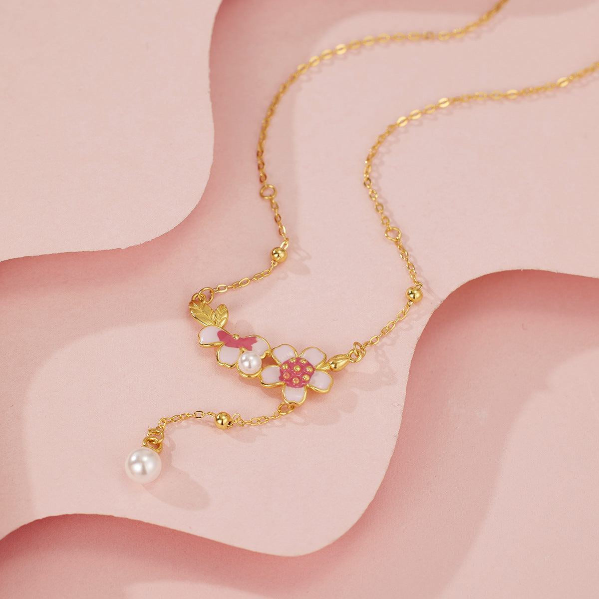 Damen filigrane Halskette mit floralen Anhängern und eleganter Perlenverzierung Shop Nory