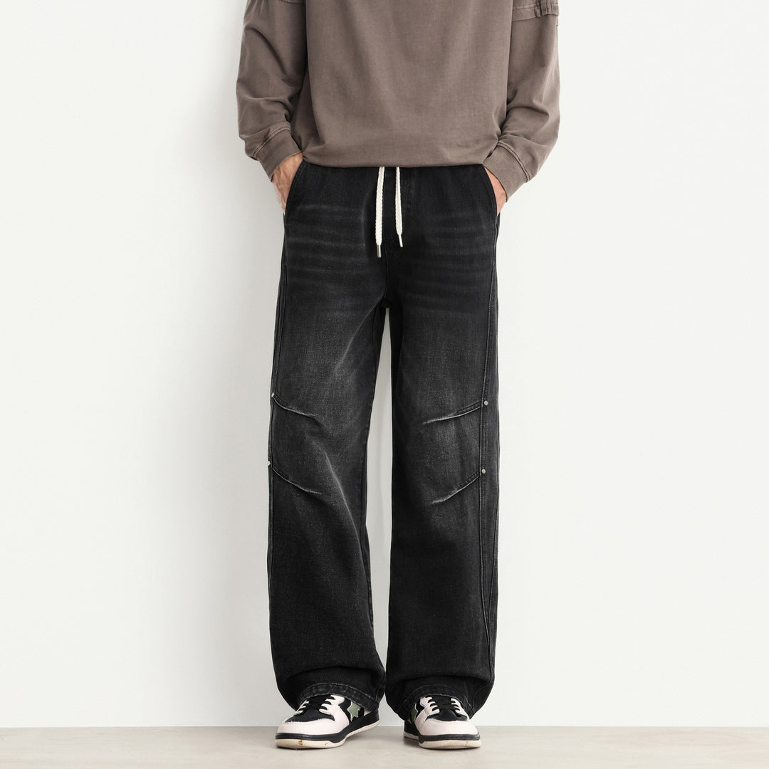 Herren Weite Denim-Hose mit Tunnelzugbund, Paneelnähten und Used-Waschung Shop Nory