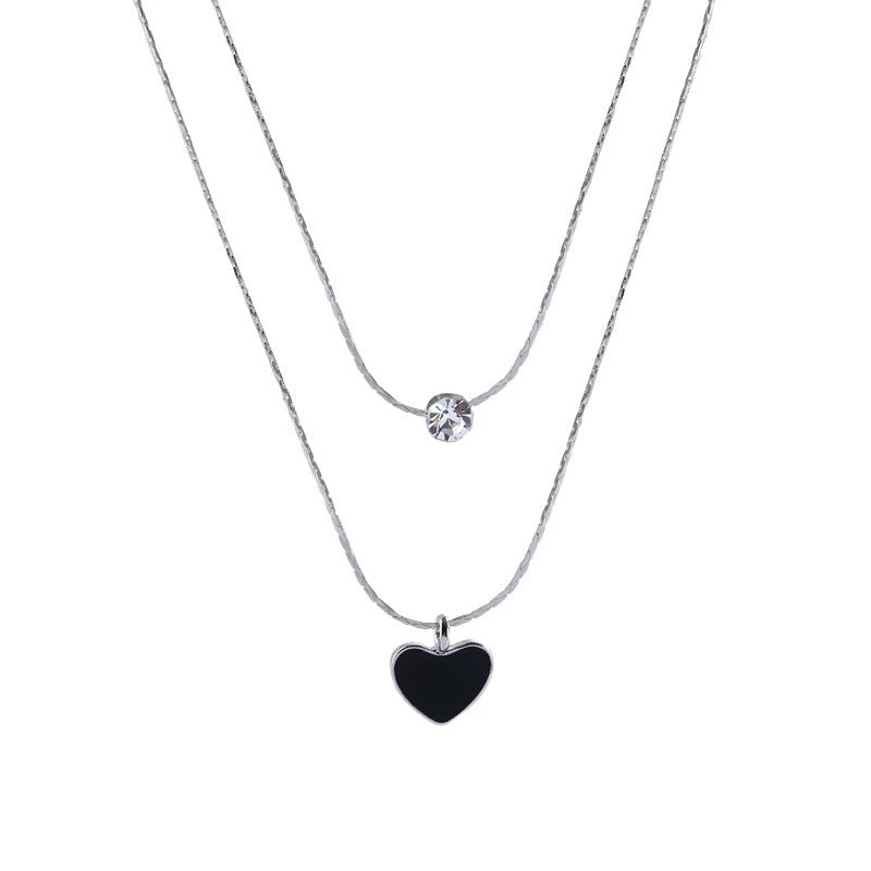 Damen mehrlagige Halskette mit herzförmigem Anhänger und funkelnden Details Shop Nory