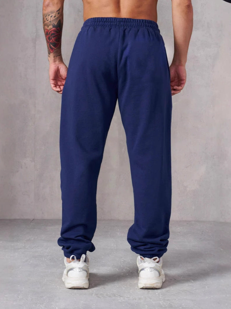 Herren Baggy Jogginghose mit elastischem Bund und seitlichen Taschen