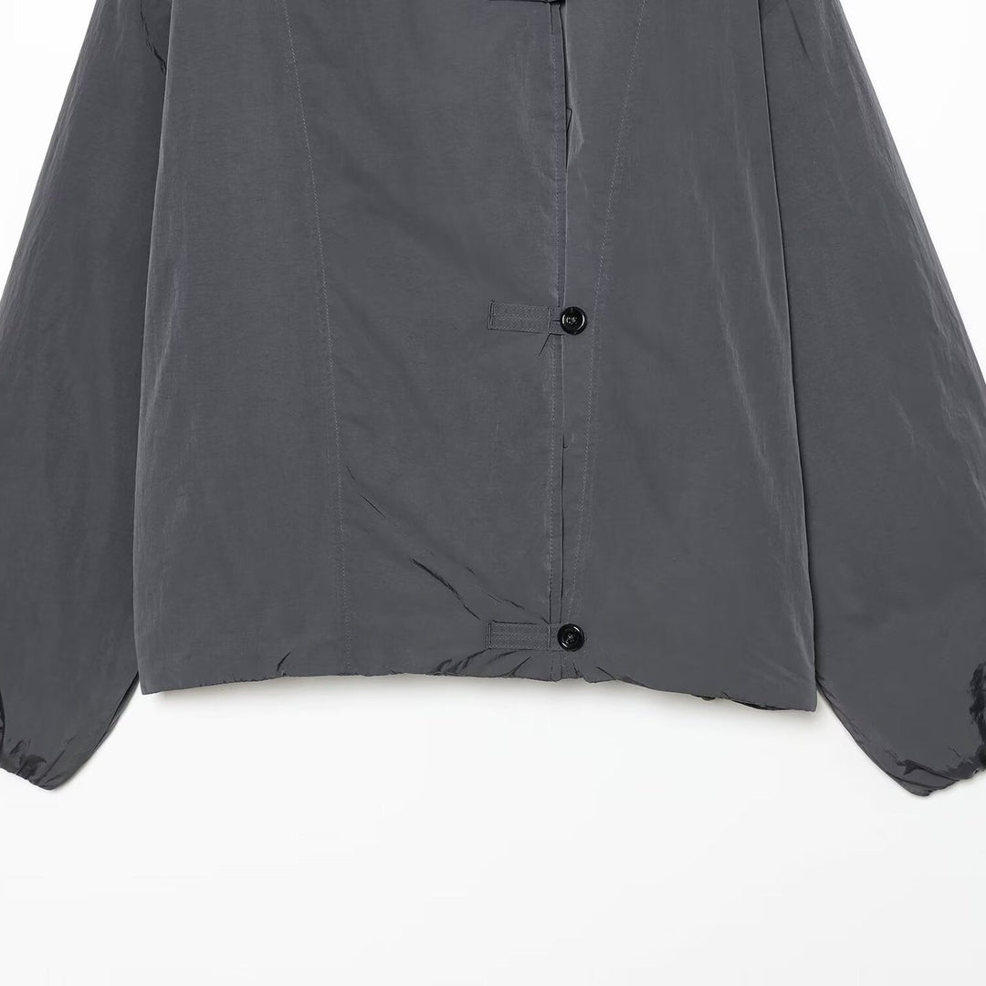 Damen Leichte Cropped Nylonjacke mit hohem Funnelkragen, Oversize-Schnitt und elastischen Bündchen Shop Nory