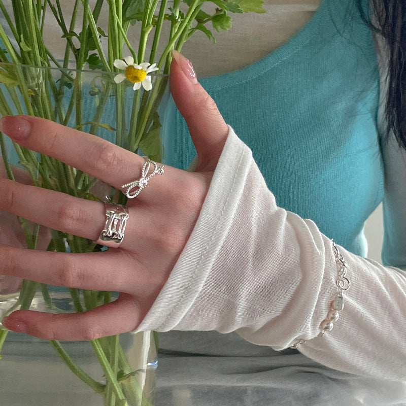 Damen Ohrstecker mit kunstvollem Schleifen-Design und funkelndem Zirkonia Shop Nory