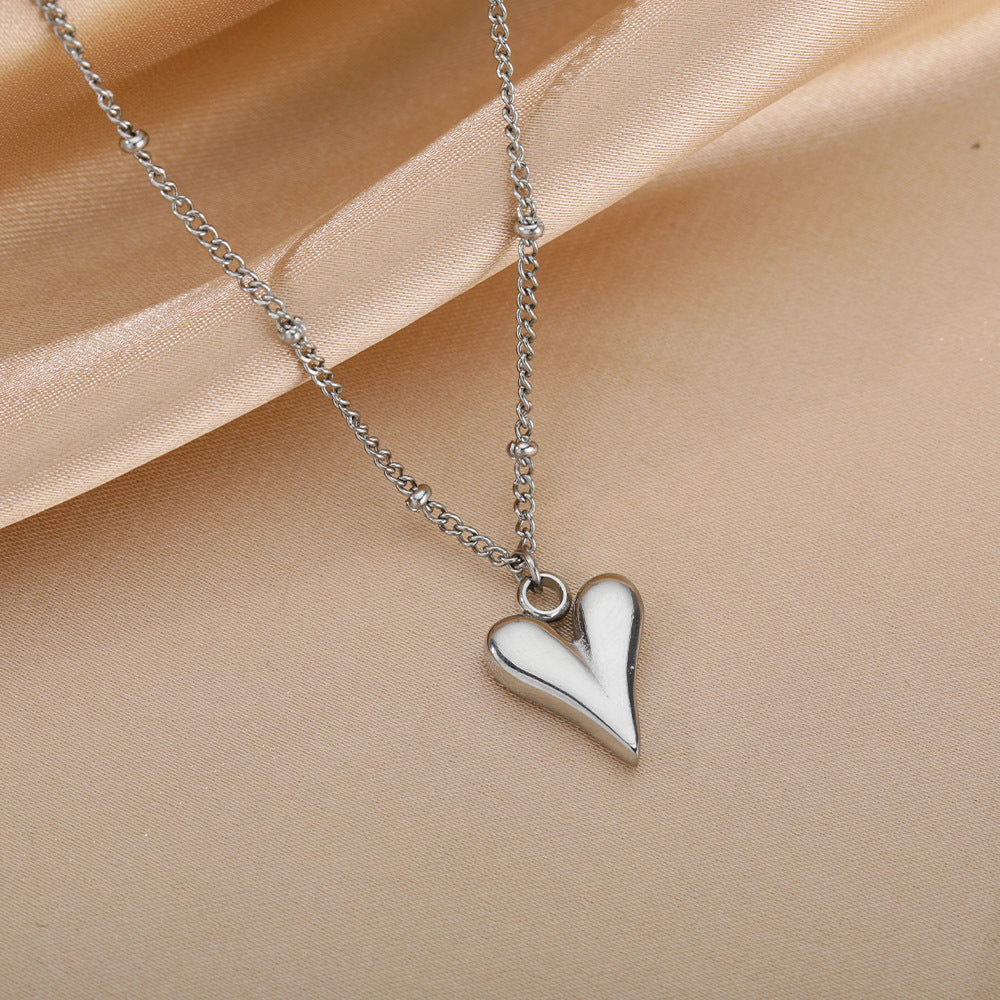 Damen Halskette mit herzförmigem Anhänger aus hochwertigem Edelstahl Shop Nory