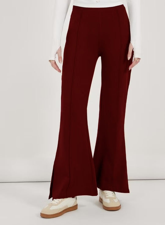 Damen Flair-Hose mit hoher Taille, durchgehender Bügelfalte und seitlichem Saumschlitz Shop Nory