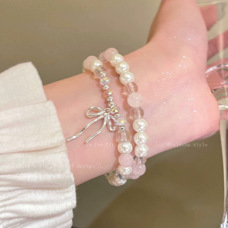 Damen Armbandset mit Perlen und charmantem Schleifenanhänger Shop Nory