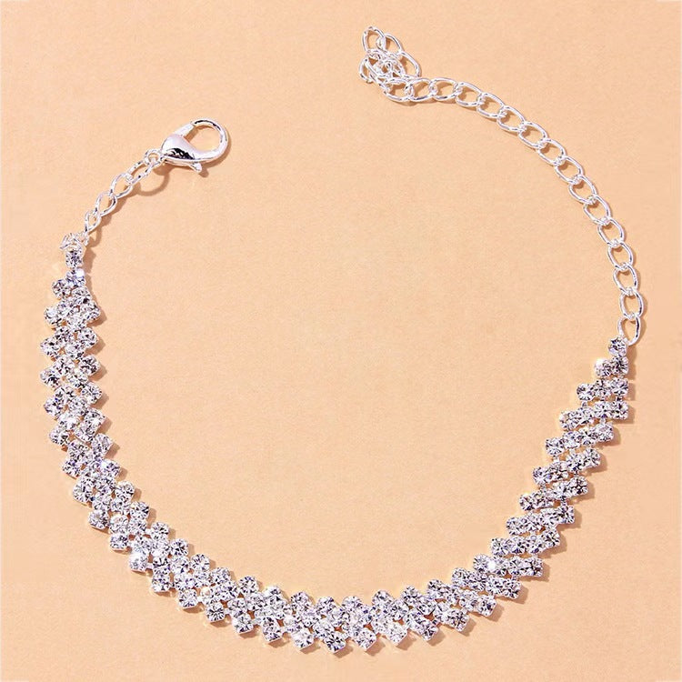 Kristallbesetztes Tennisarmband mit Verlängerungskette